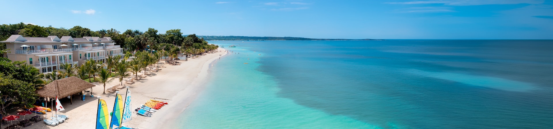 Beaches Negril branded resort image with family all-inclusive beach planning.