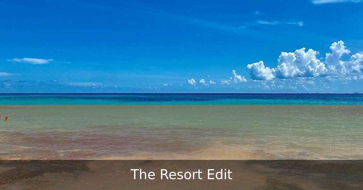 Sandals Royal Curaçao Dos Awa wing with terracotta architecture and sunset-facing swim-up pools