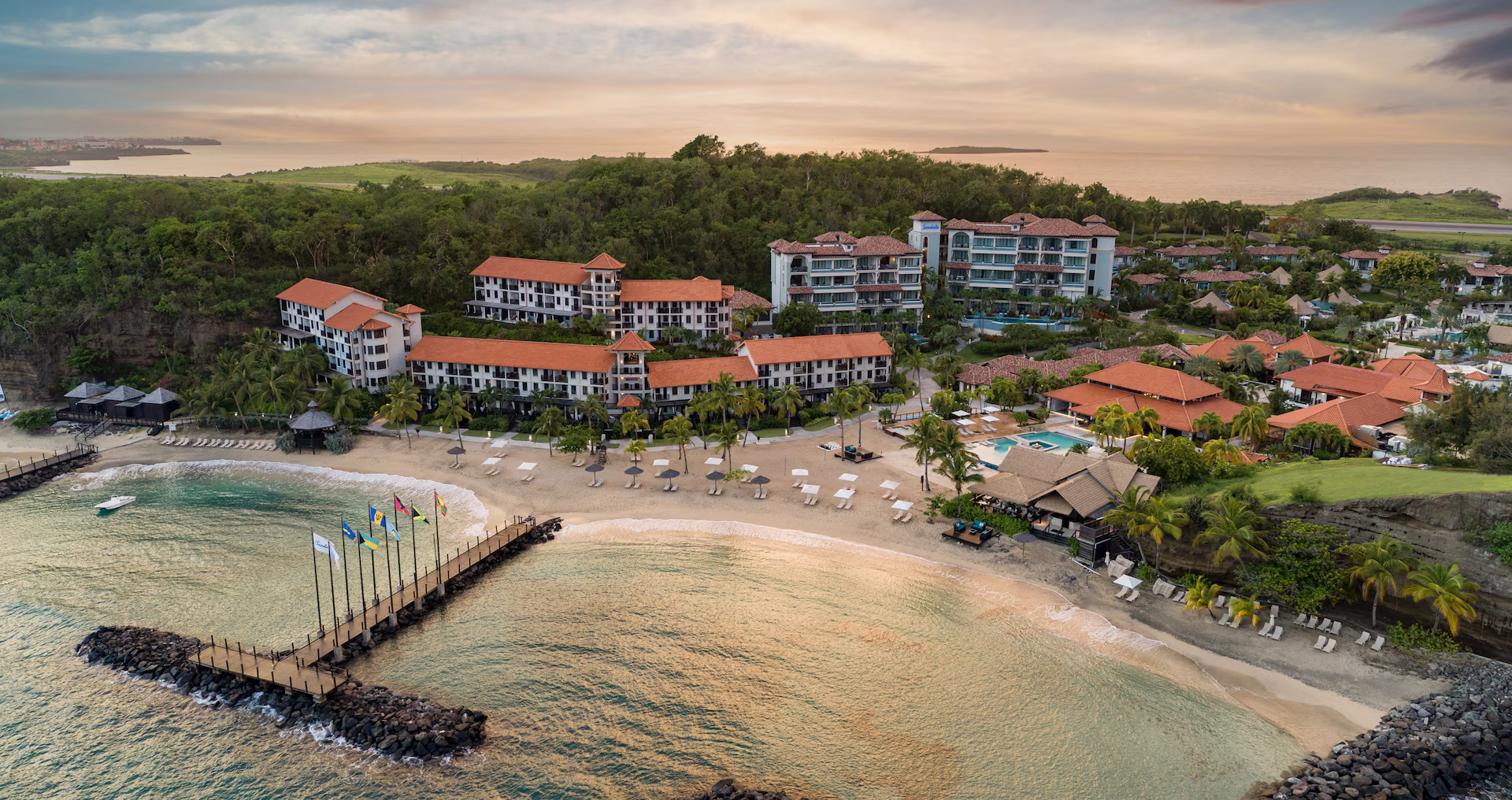Sandals Grenada infinity pool and lush tropical gardens at Pink Gin Beach