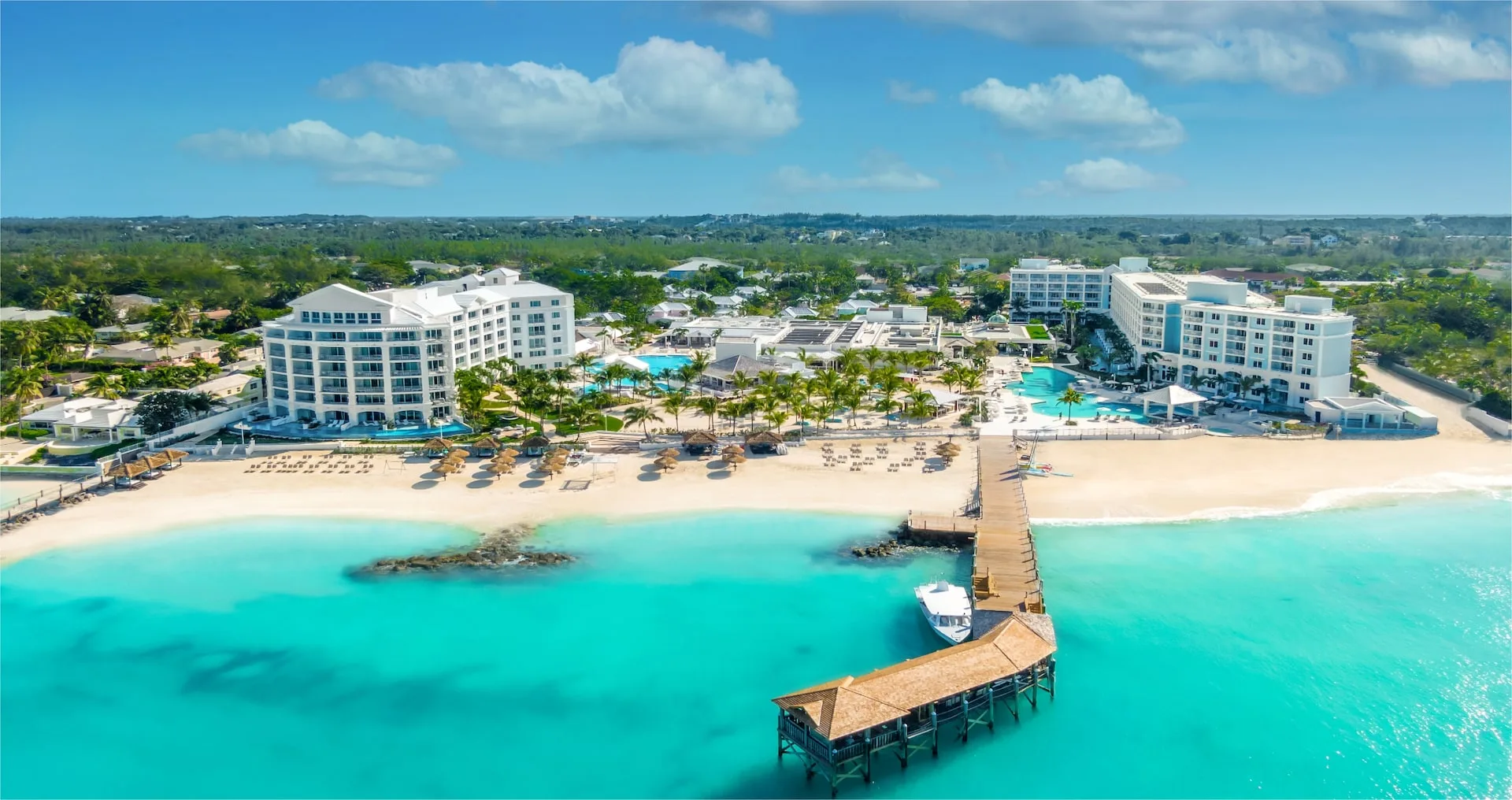Sandals airport transfer guide showing couples arriving at resort