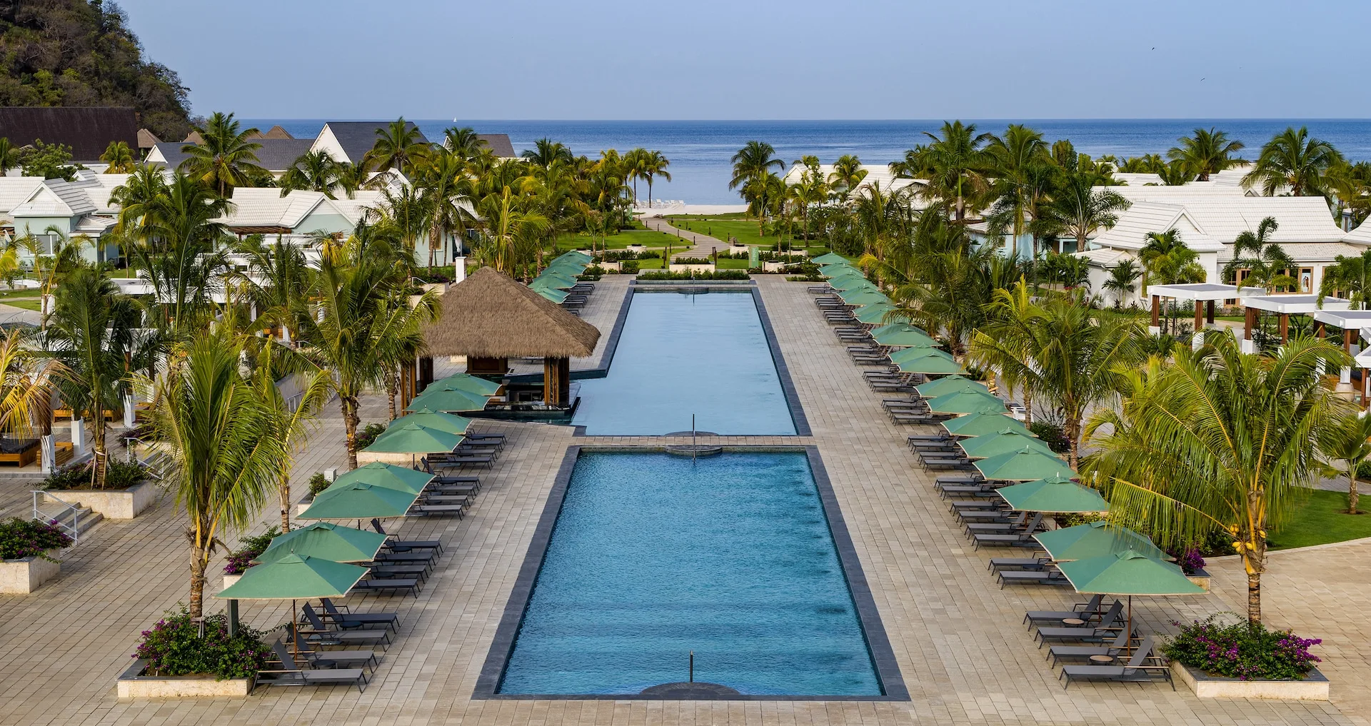 Sandals Saint Vincent hillside pool deck with ocean beyond