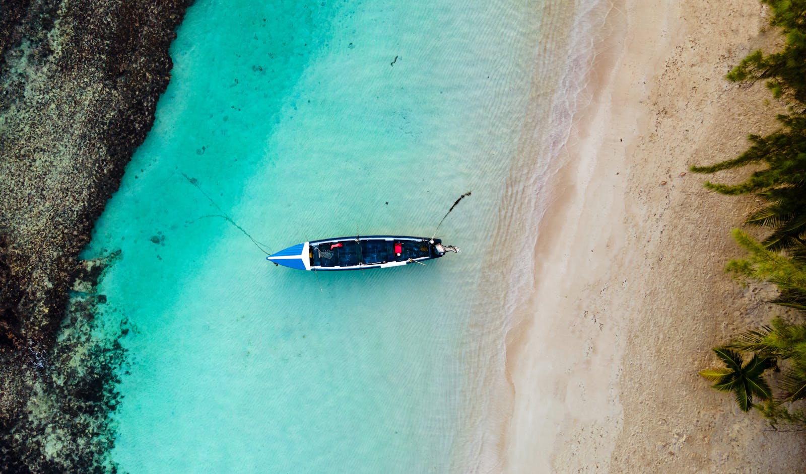 Lounge chairs and umbrellas on a quiet stretch of beach