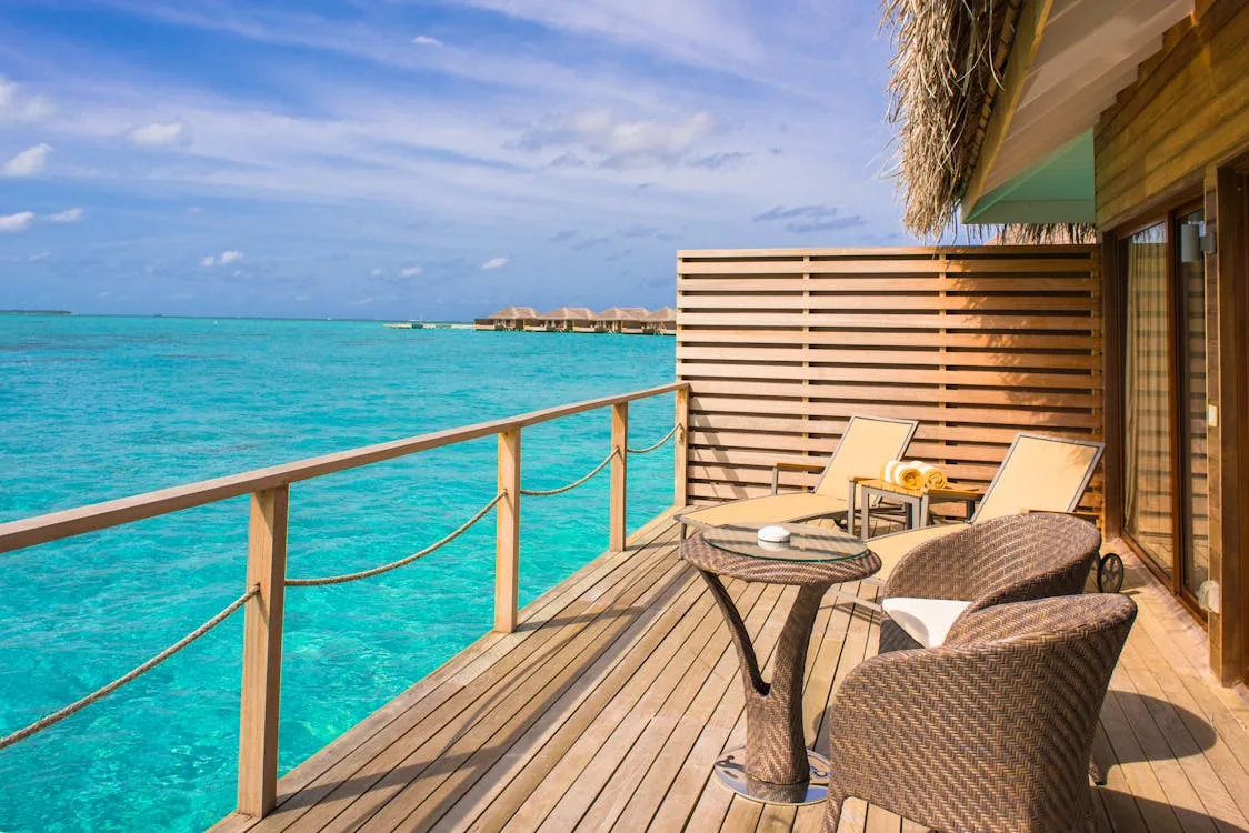 Sandals Barbados vs Grenada comparison guide showing split resort imagery