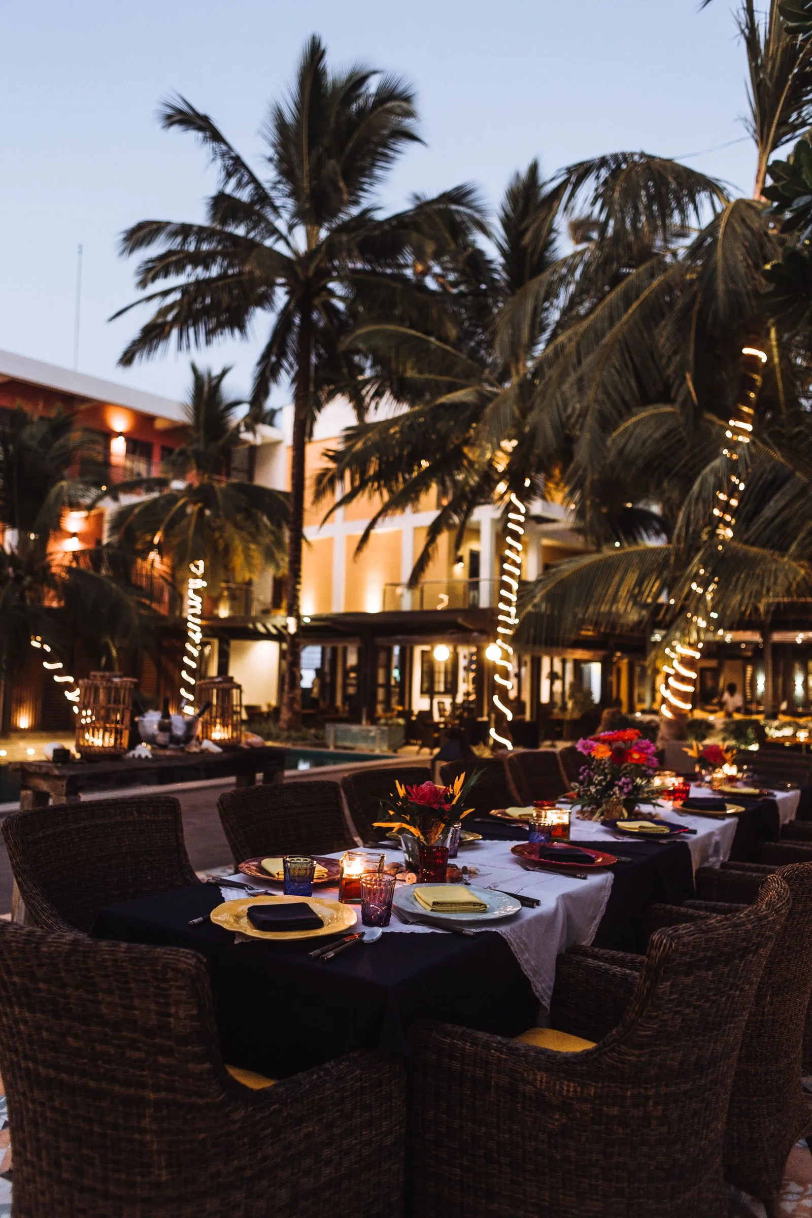 Sandals Grenada Pink Gin Beach evening with tiki torches