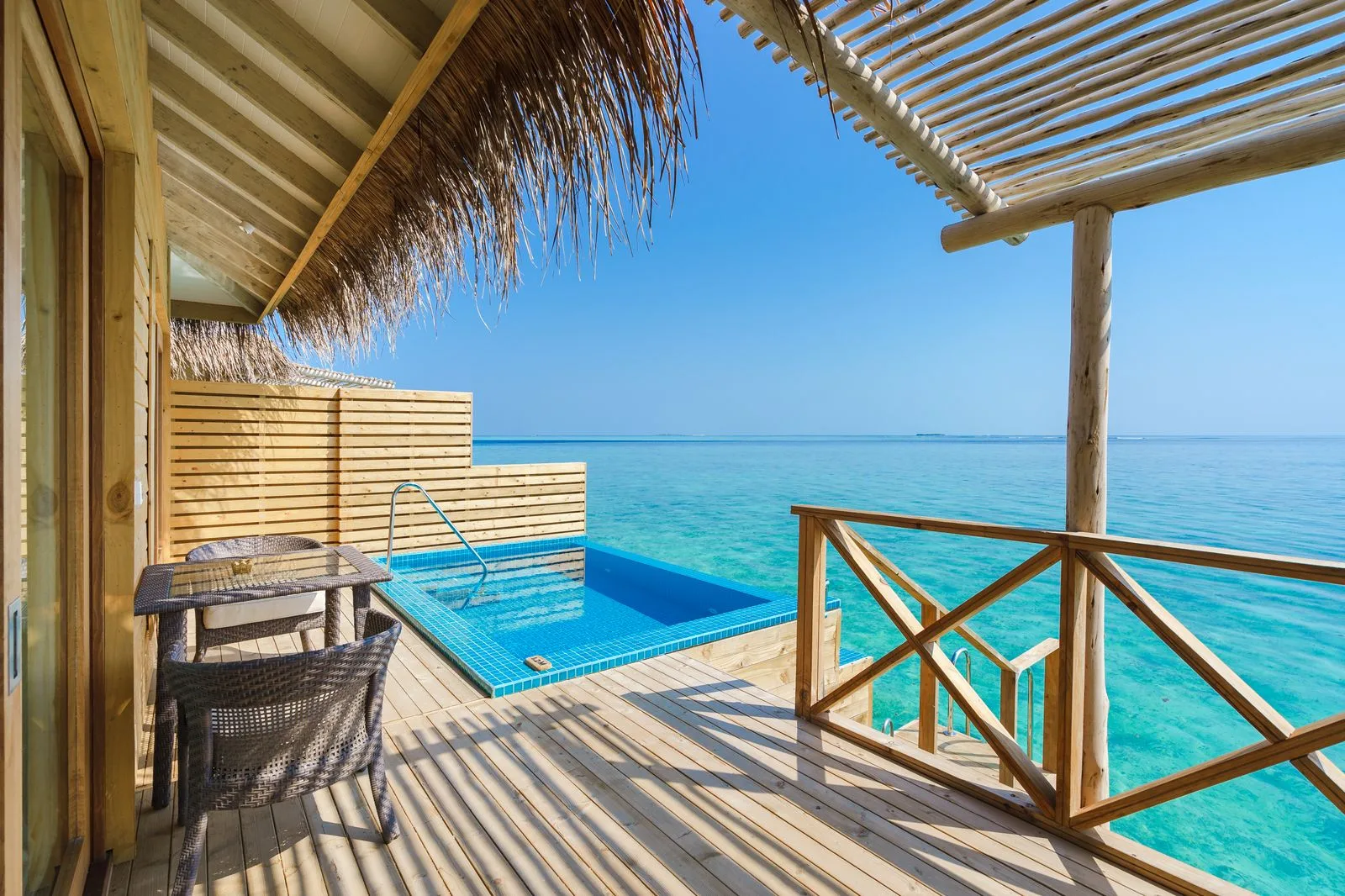 Swim-up overwater villa with private deck