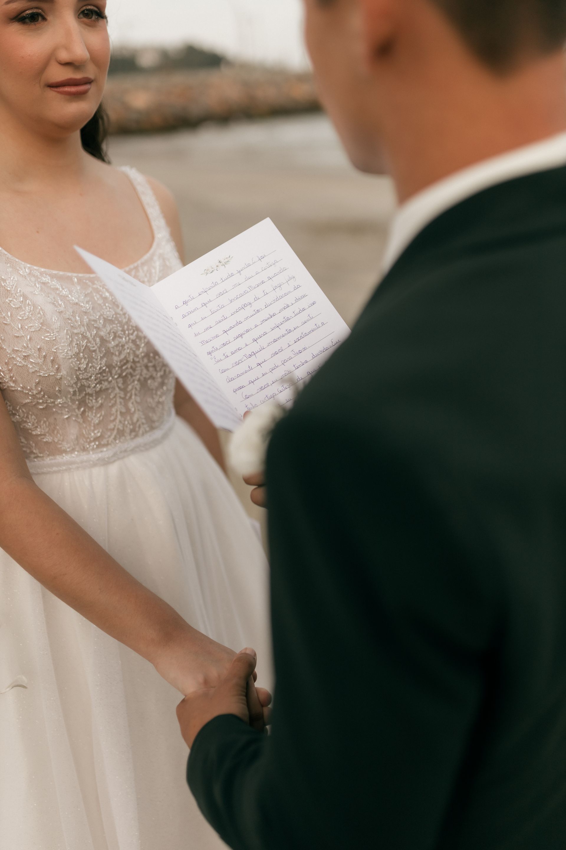 Romantic beach wedding ceremony vows exchange